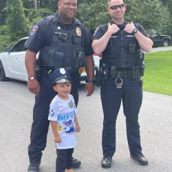 officers with child fun day