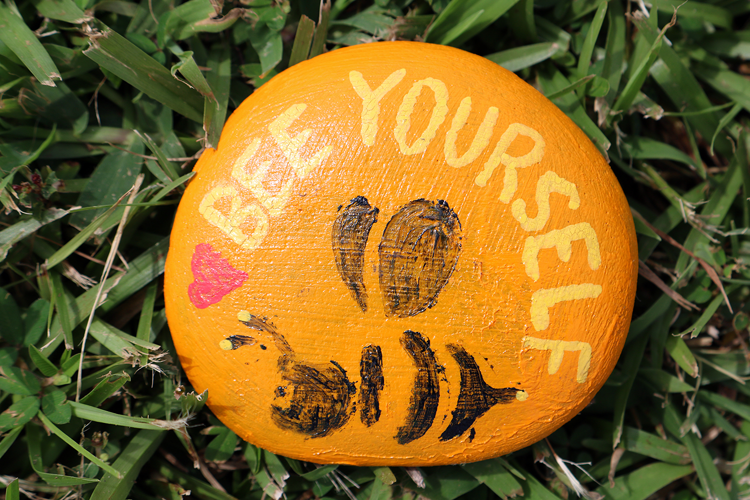 Painted rock with words of encouragement