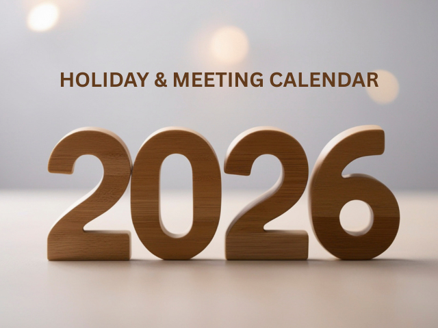 Number 2026 sitting on table with lights in background