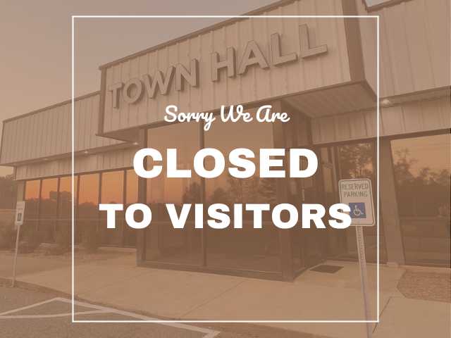 Front of Town Hall with closed notice